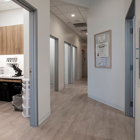 Hallway leading to exam rooms at Belterra Eyecare